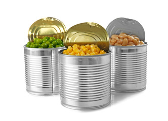 Open tin cans with different food on white background
