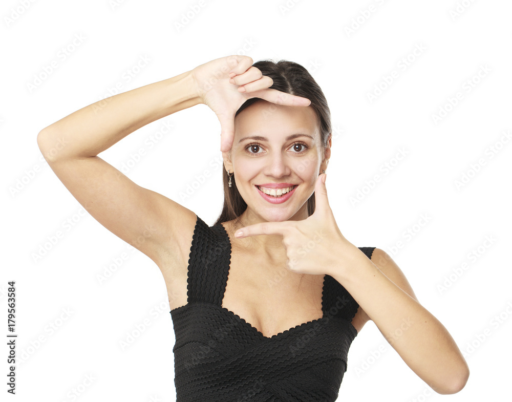 Portrait of young beautiful brunette woman making frame with her hands Portrait of young beautiful brunette woman making frame with her hands