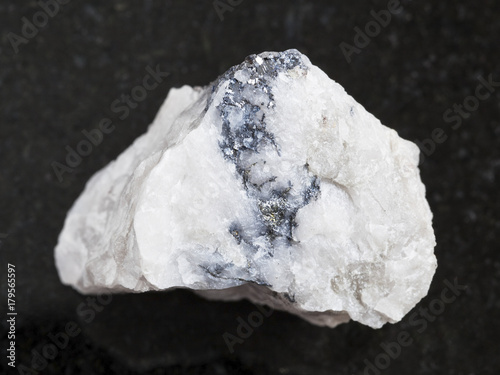 rough Wolframite ore on dark background