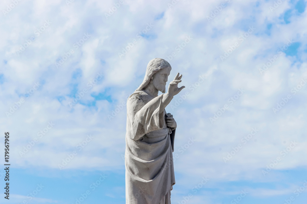 statue of jesus in blue sky at Notre-Dame de la Garde church in Marseille, France