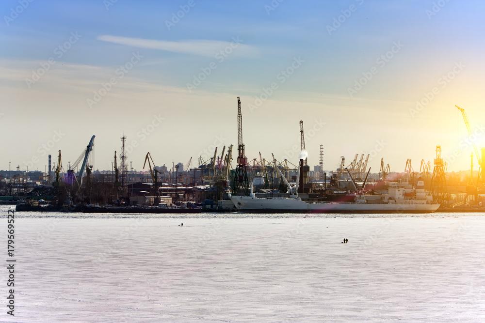 View from the Gulf of Finland covered with ice on St. Petersburg seaport. Russia..