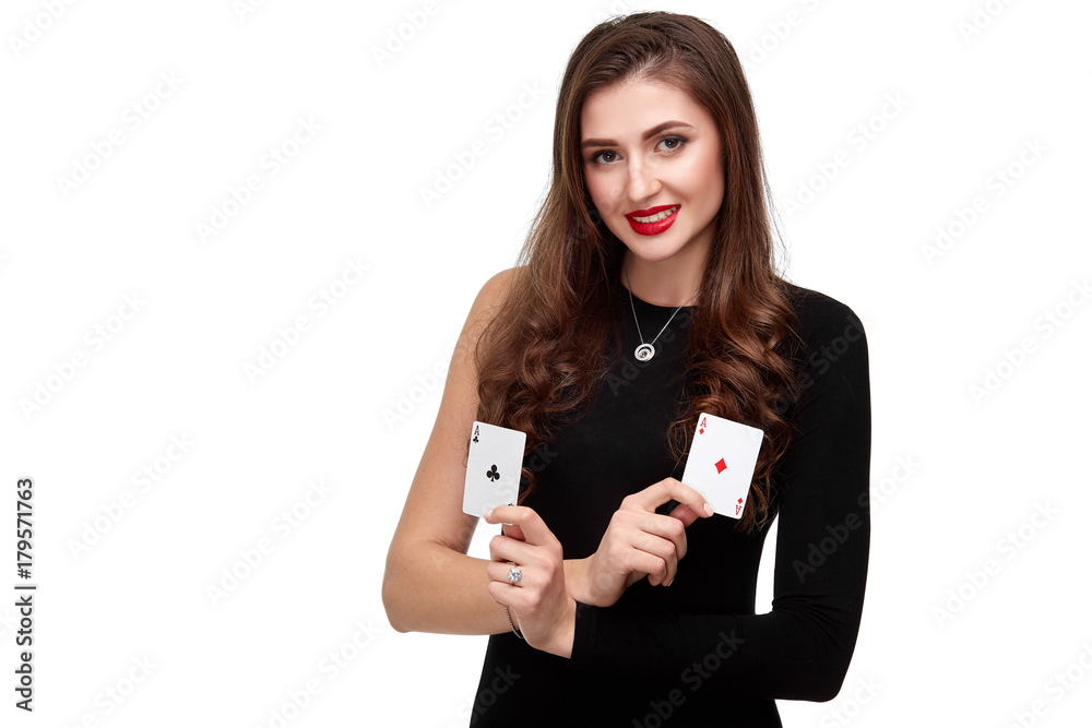 Sexy curly hair brunette posing with two aces cards in her hands, poker concept isolation on white background Sexy curly hair brunette posing with two aces cards in her hands, poker concept isolation on white background