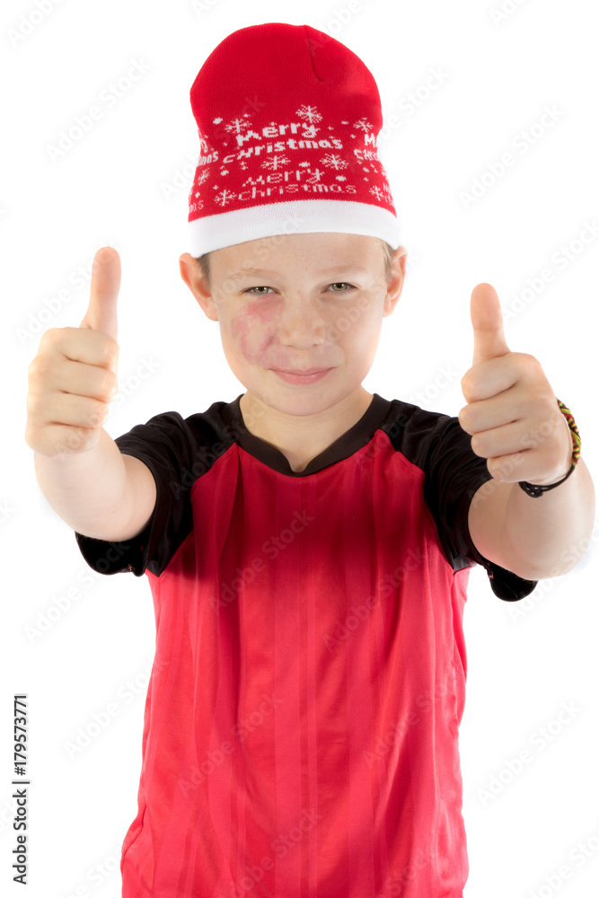 Pre-teen boy wearing a santa hat