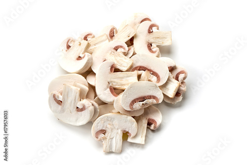 Sliced champignons, top view, isolated on white background.