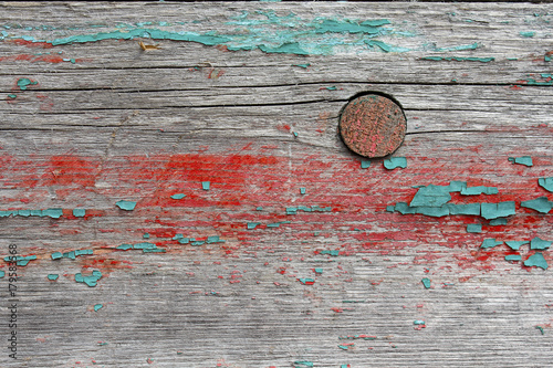 Old board with the remains of paint. Backgrounds and textures