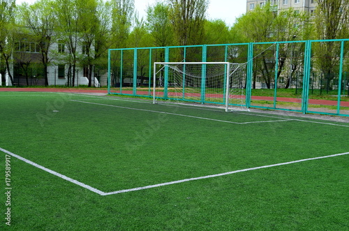 football field with artificial turf, angle, background