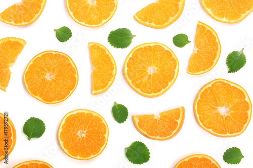 Slices of orange or tangerine with mint leaves isolated on white background. Flat lay, top view. Fruit composition