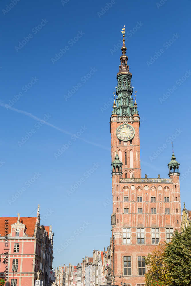 View of the Main Town Hall located at Long Market Street (Long Lane) at the Main Town (Old Town) in Gdansk, Poland, on a sunny day.