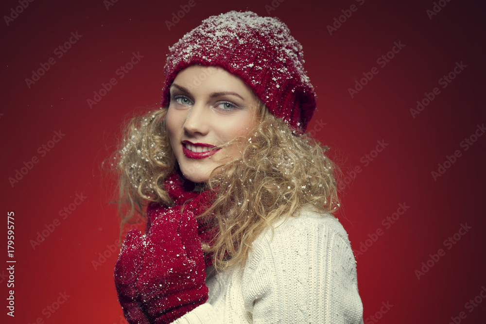 beautiful young girl on a red background beautiful young girl on a red background