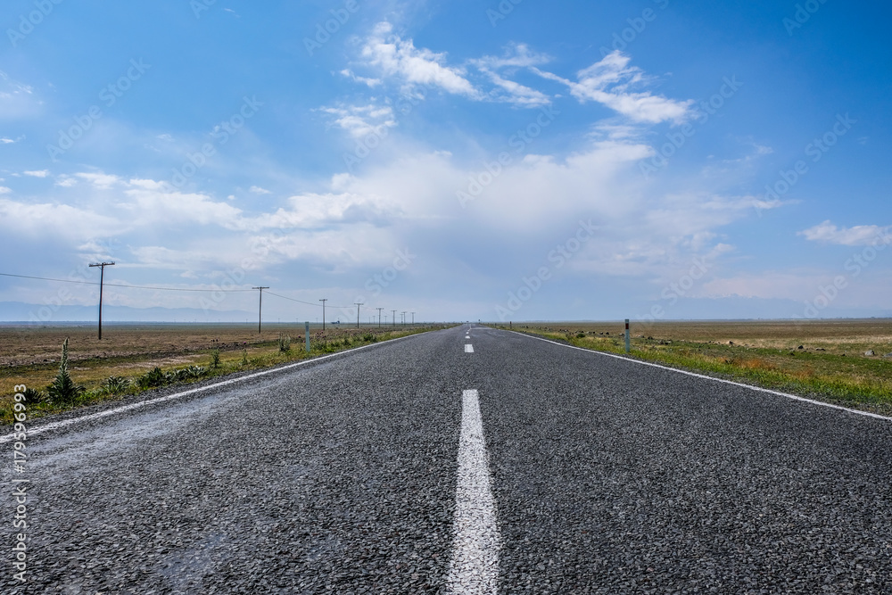 Asphalt Road Trip and Blue Clean Sky