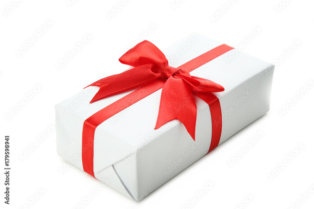 White gift box with ribbon isolated on white White gift box with ribbon isolated on white