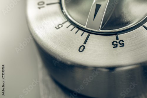 0 Minutes - 1 Hour - Macro Of An Analog Chrome Kitchen Timer On Wooden Table