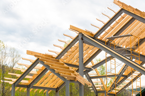 Steel frame with wooden beams construction.