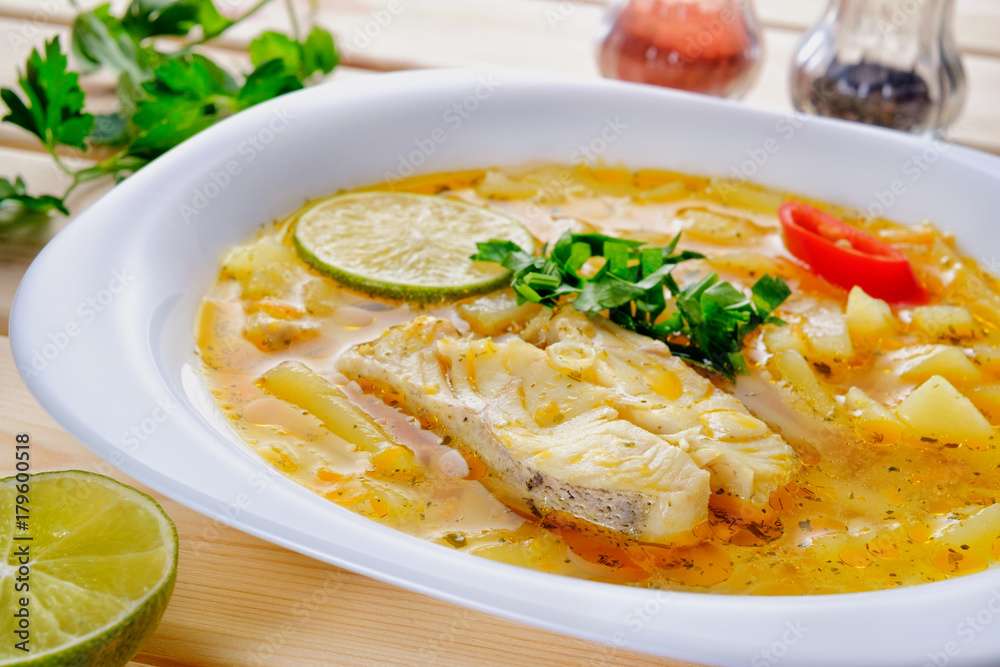 fish soup with parsley, lime and pepper