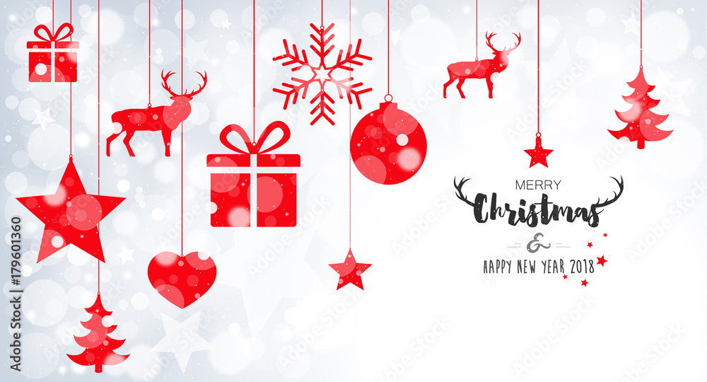 Christmas card with hanging red balls on bokeh