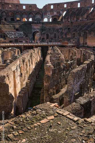 Shadows of deep circular galleries of Colosseum, Flavian Amphitheater in Rome, Italy