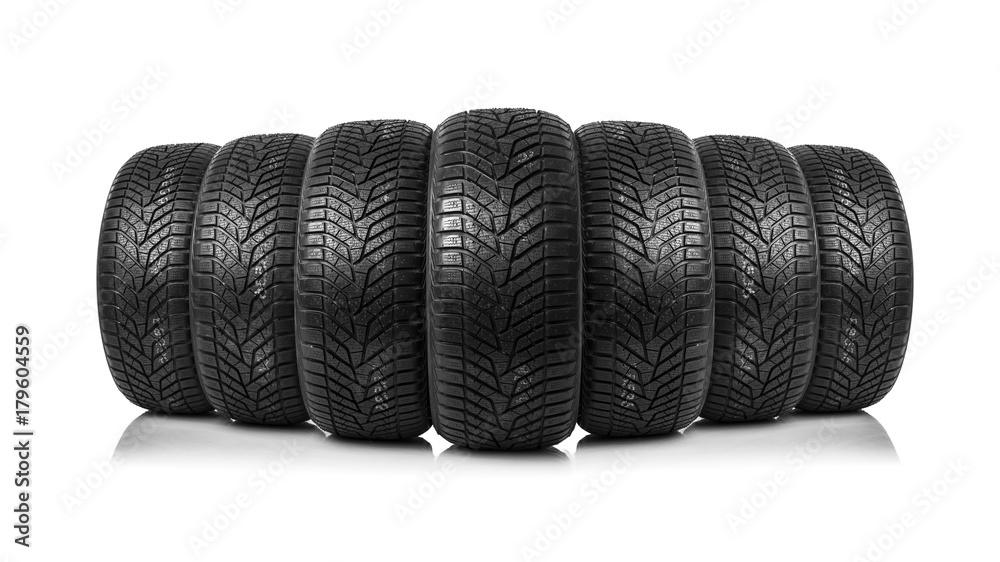 Winter tires on a white background. Winter tires on a white background.