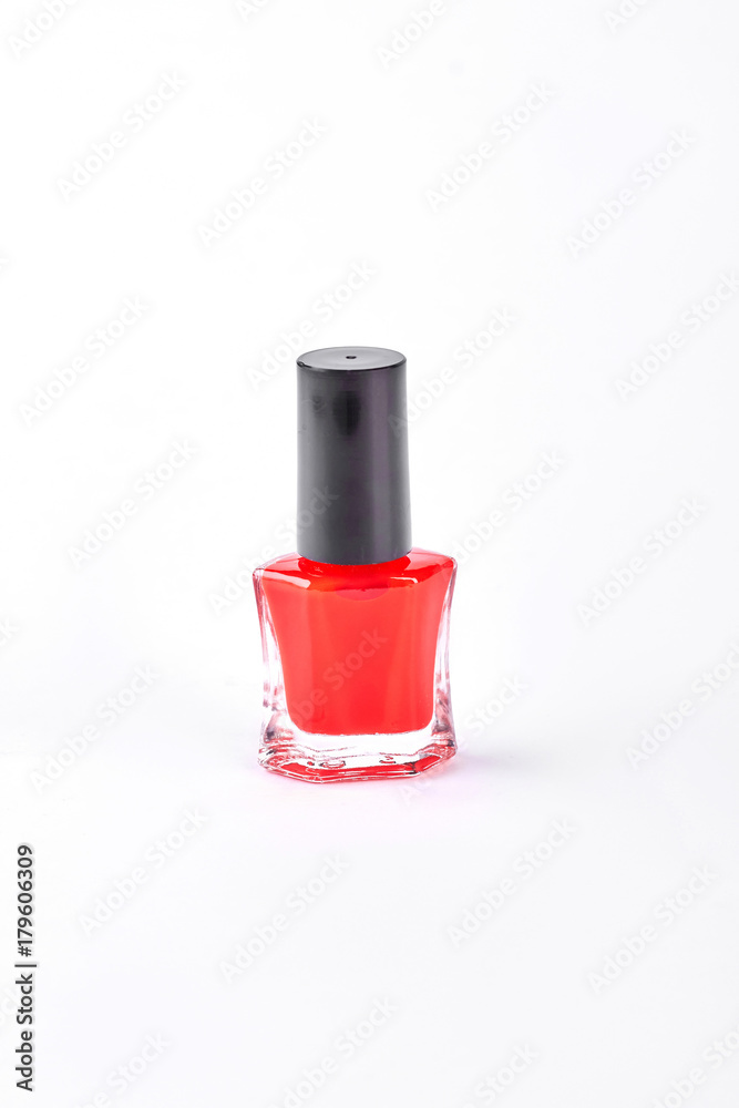 Red nail polish on white background. Classic red varnish for manicure or pedicure isolated on white background. Red nail polish on white background. Classic red varnish for manicure or pedicure isolated on white background.