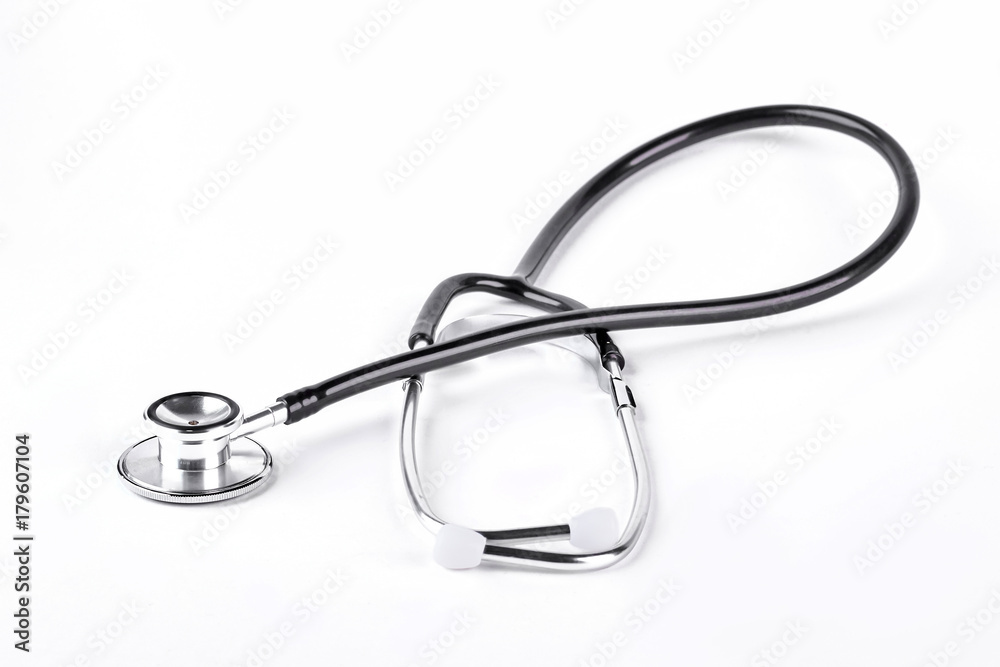 Medical stethoscope over white background. Medical instument for heartbeat listening isolated on white background. Medical stethoscope over white background. Medical instument for heartbeat listening isolated on white background.
