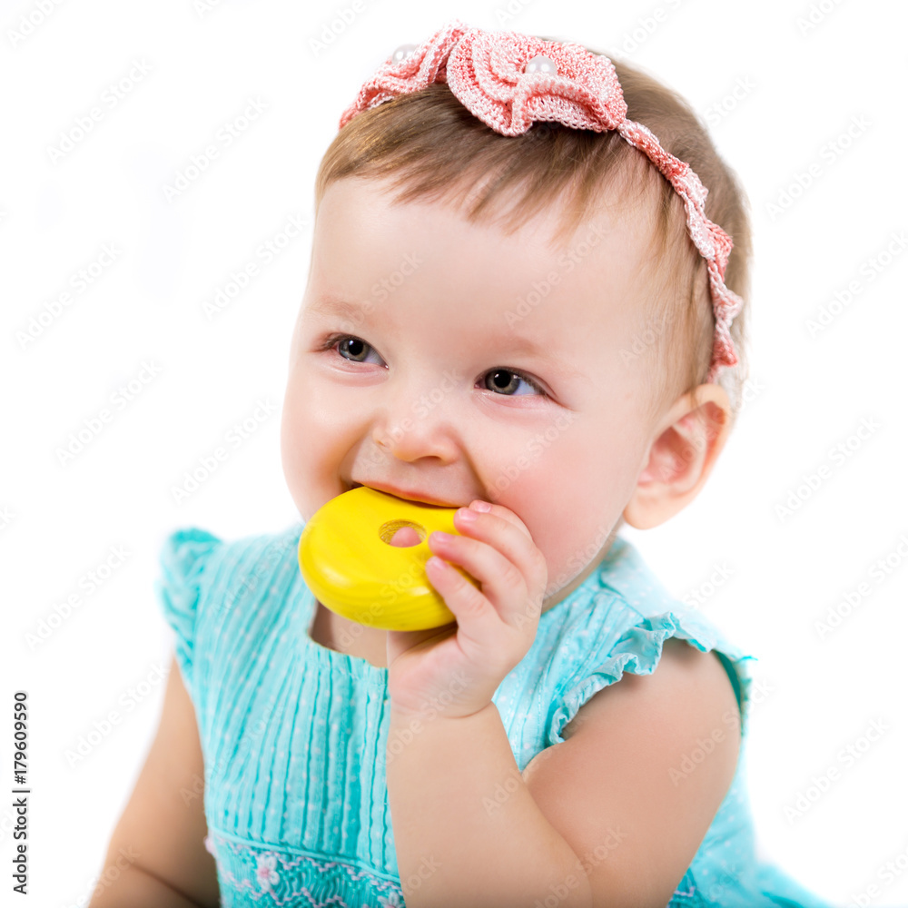 Portrait of a beautiful little girl. Photo of a child closeup on a white background Portrait of a beautiful little girl. Photo of a child closeup on a white background