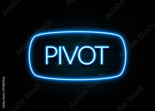 Pivot  - colorful Neon Sign on brickwall