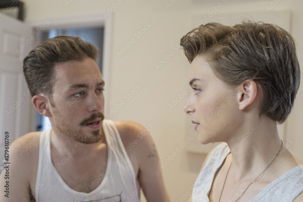 Young couple talking together Young couple talking together