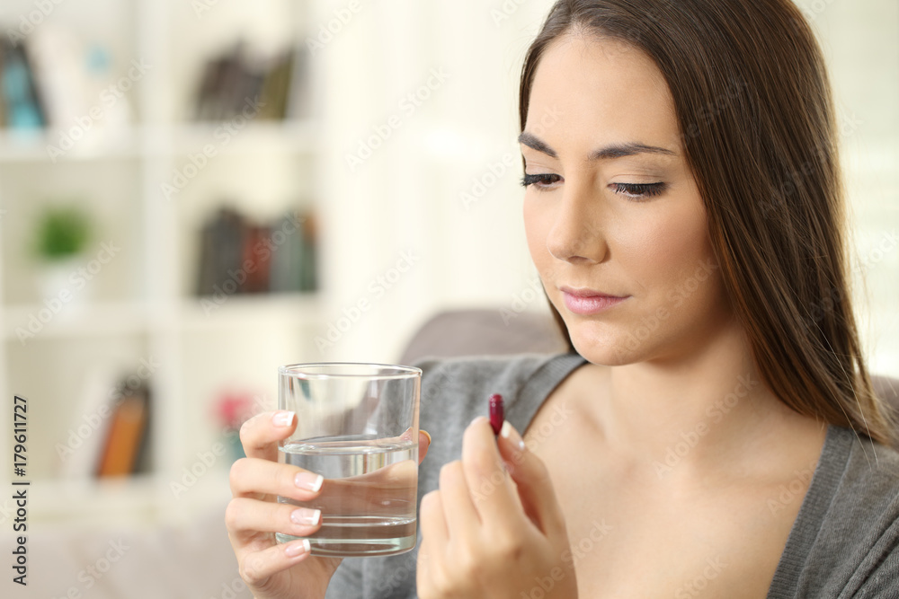 Lady ready to take a pill Lady ready to take a pill