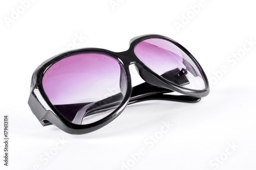 Female sunglasses with purple glass. Woman oversized sunglasses with black plastic frame.