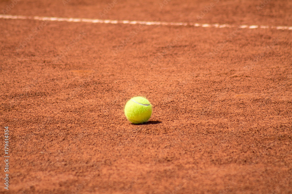Tennis Ball on the ground court