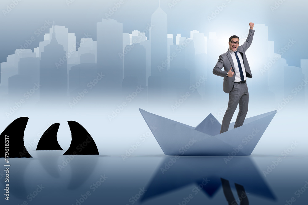 Obraz premium Excited businessman riding paper ship boat