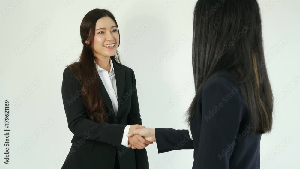 4k of Two businesswomen introduce themselves. Businesswomen Shaking Hands 4k of Two businesswomen introduce themselves. Businesswomen Shaking Hands
