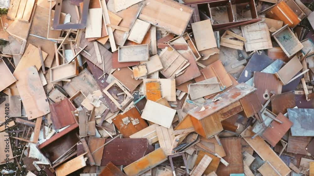 old aged retro desk bureau furniture falling down huge bunch table crashed chairs seats outdoor thrown out stool throwing trash junk garbage waste material interior used equipment decline flying trash