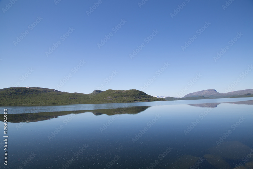 View of the lake Alanen Kilpisjärvi, in the horizon the mountain Saana, summer 