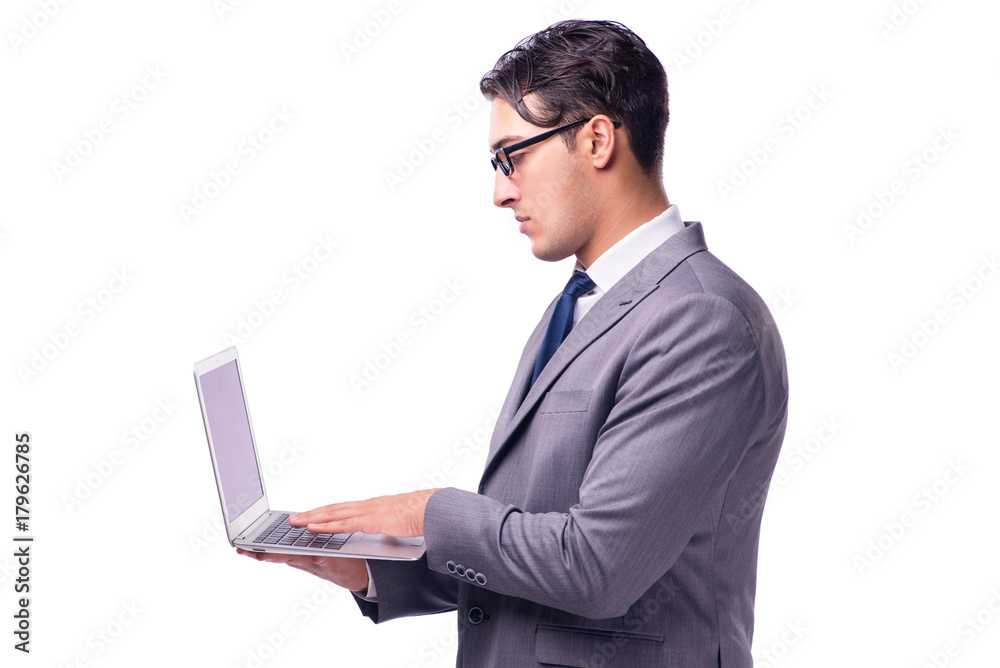Young businessman working on laptop isolated white Young businessman working on laptop isolated white