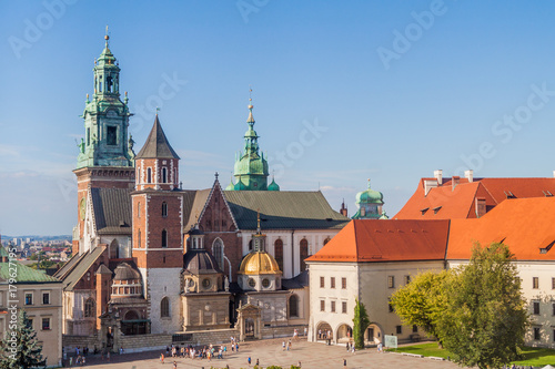 KRAKOW, POLAND - SEPTEMBER 4, 2016: Tourists visit Wawel castle in Krakow, Poland