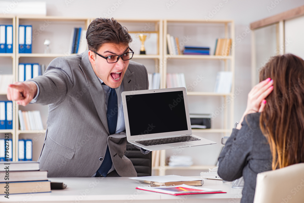 Business meeting between businessman and businesswoman Business meeting between businessman and businesswoman