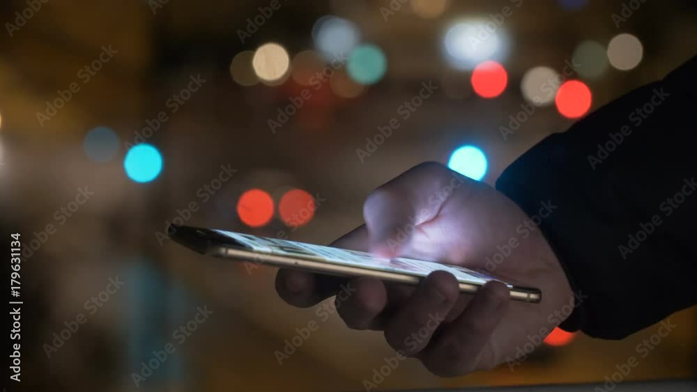 Hand scrolling browsing on a smartphone