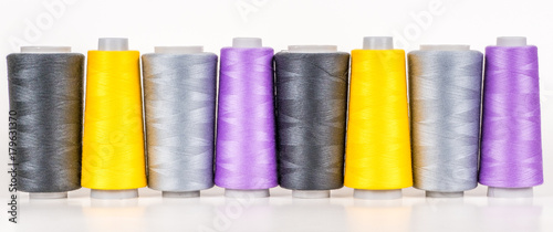 Vary colored thread coils photo