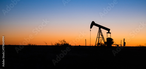 Texas Oil Pump Jack Fracking Crude Extraction Machine Sunset photo