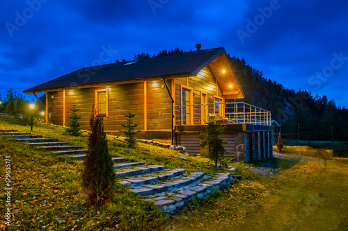 Wooden cottage in the backg...