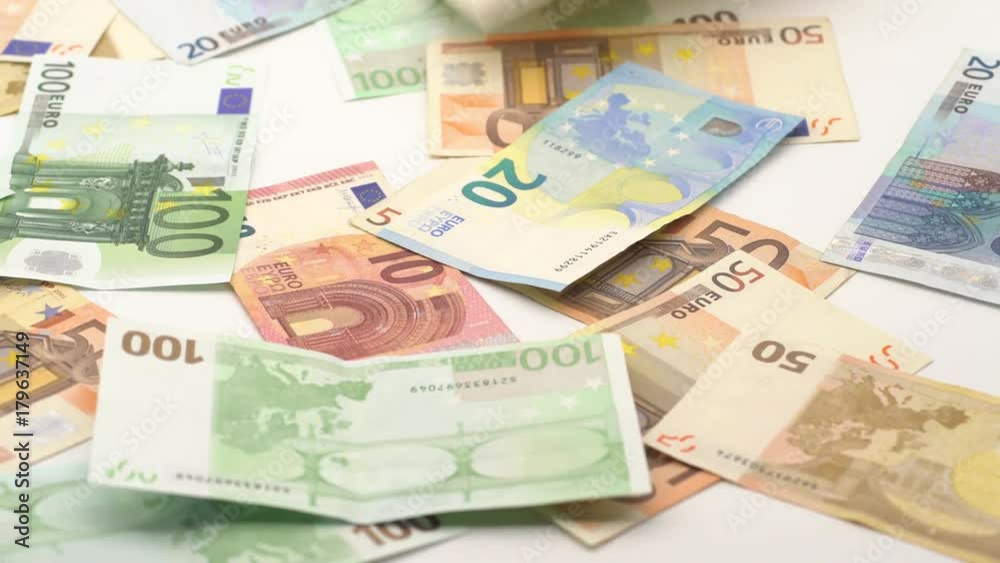 4K Dolly sliding shot of euros are falling. Banknotes of different values. Euro cash money background. Good earnings. Issuing the salary. Bank percent deposit. Credit percent. Successful business-Dan 4K Dolly sliding shot of euros are falling. Banknotes of different values. Euro cash money background. Good earnings. Issuing the salary. Bank percent deposit. Credit percent. Successful business-Dan