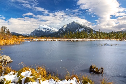 Fototapeta Naklejka Na Ścianę i Meble -  Vermilion Lakes Scenic Landscape Autumn Panorama and Distant Snowy Mountain Tops in Banff National Park Canadian Rocky Mountains