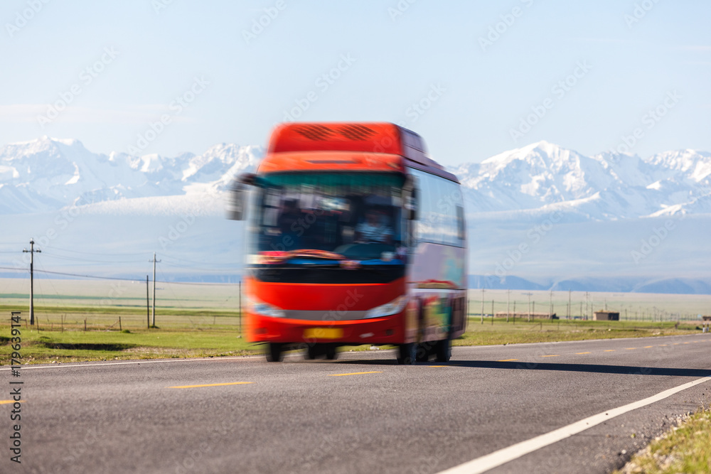 bus drives on road