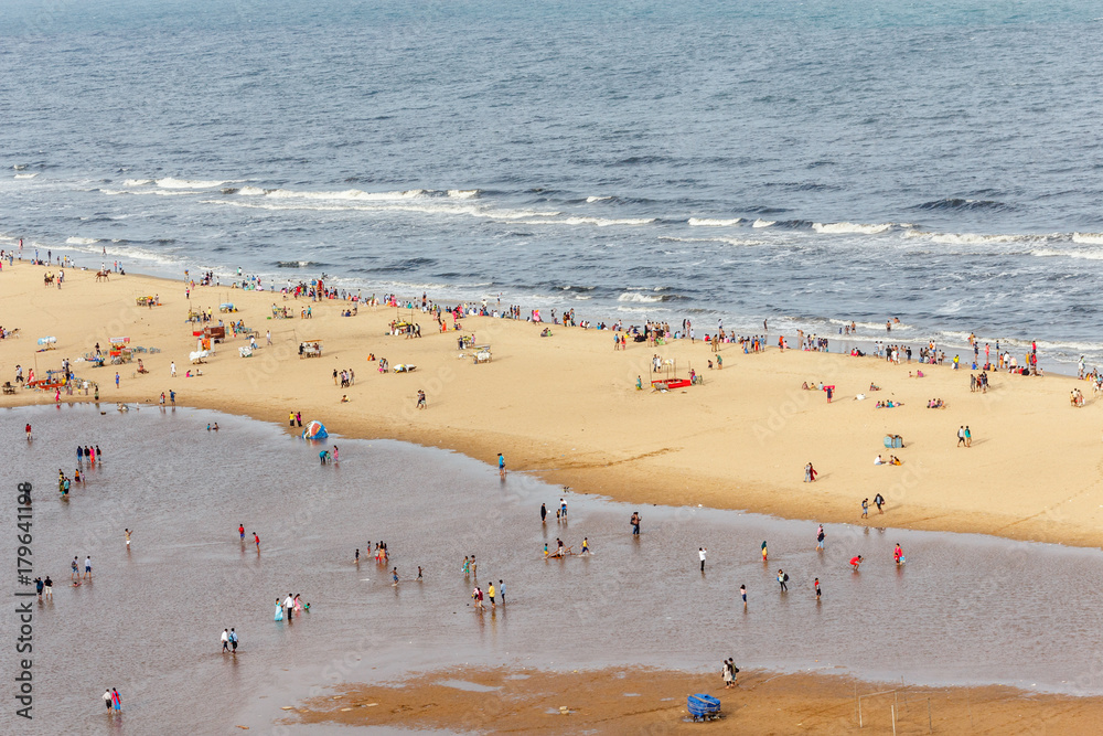 Birds eye view from light house. Temporary water pond formed in the marina beach due to heavy rainfall.ts longest natural urban beach in India and one of the world's longest beach ranking. Birds eye view from light house. Temporary water pond formed in the marina beach due to heavy rainfall.ts longest natural urban beach in India and one of the world's longest beach ranking.