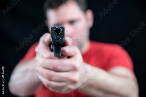 Armed Man Pointing Hand Gun