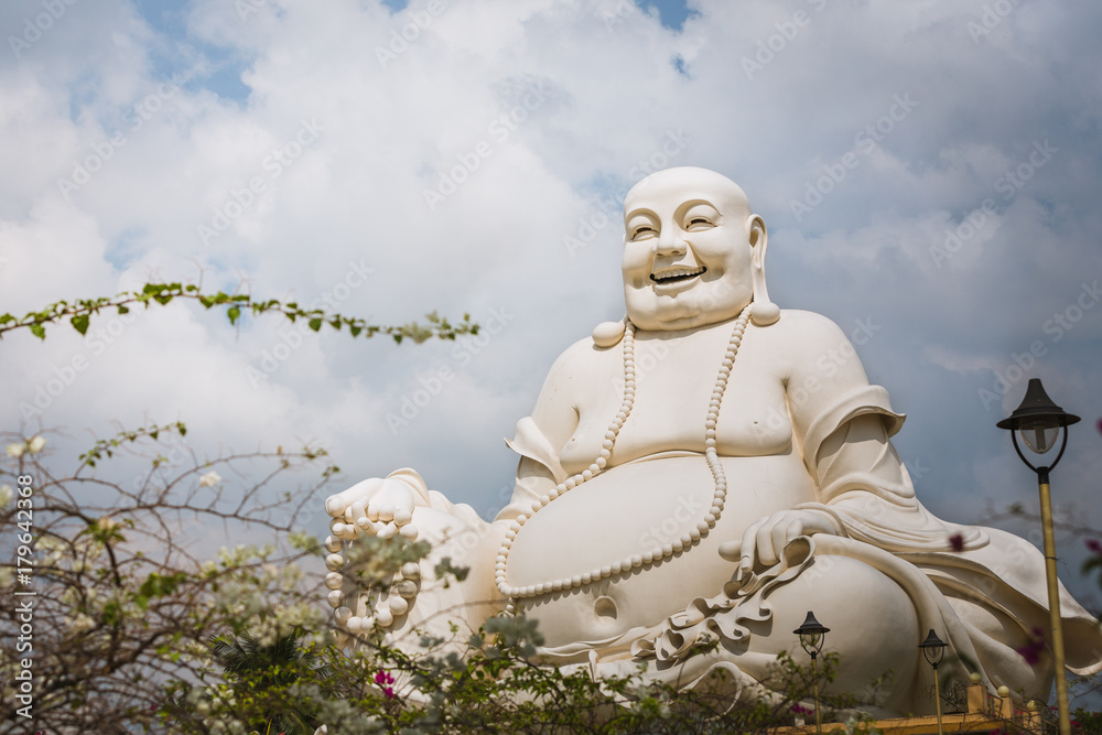 Fototapeta premium Statue of a laughing Buddha