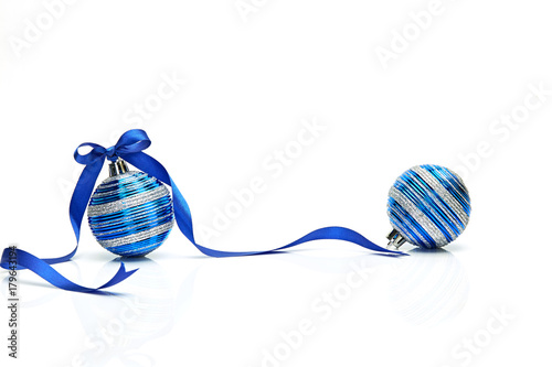 Blue Christmas ball with ribbon bow on white background photo