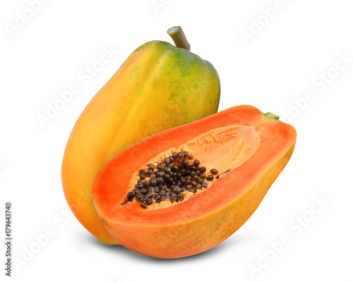 whole and half of ripe papaya isolated on white background