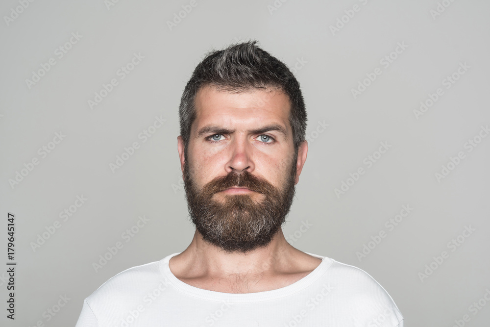 Fototapeta premium Guy or bearded man on grey background.