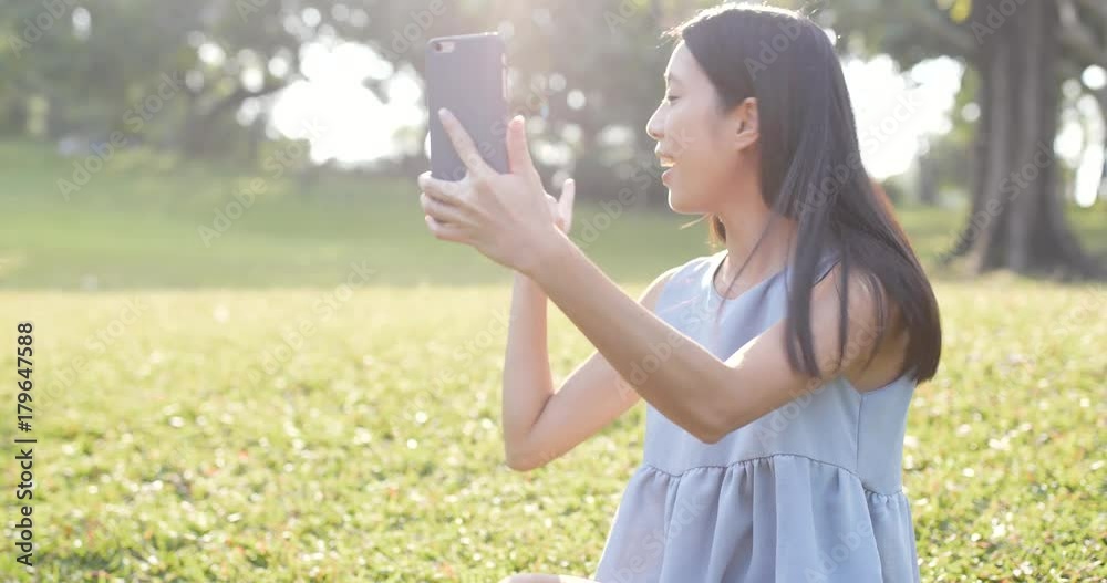 Woman making a video call at outdoor